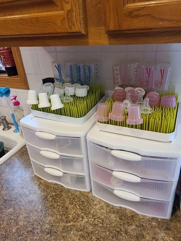 how to organize baby stuff in kitchen via storage bins