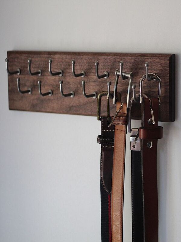Organize belts in closet on a belt hanger