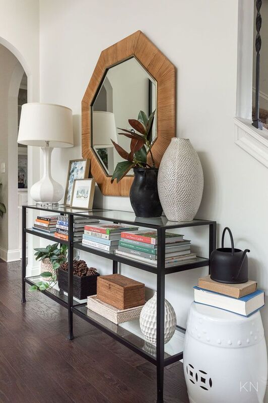 how to organize books without a bookshelf  using a console table