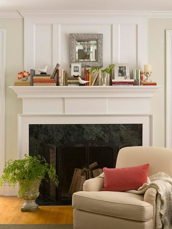 how to organize books without a bookshelf on fireplace mantel