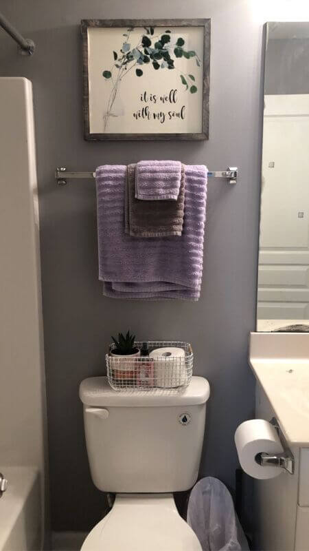 over the toilet decor towel on a narrow rack