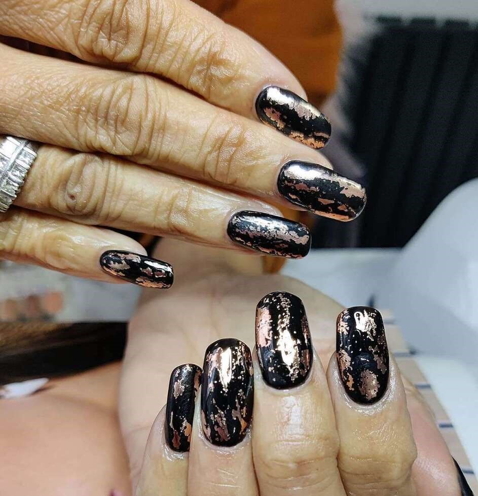 long black and rose gold nails