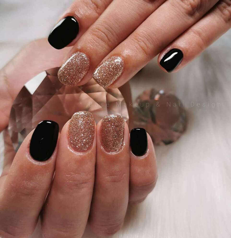 black and rose gold nails