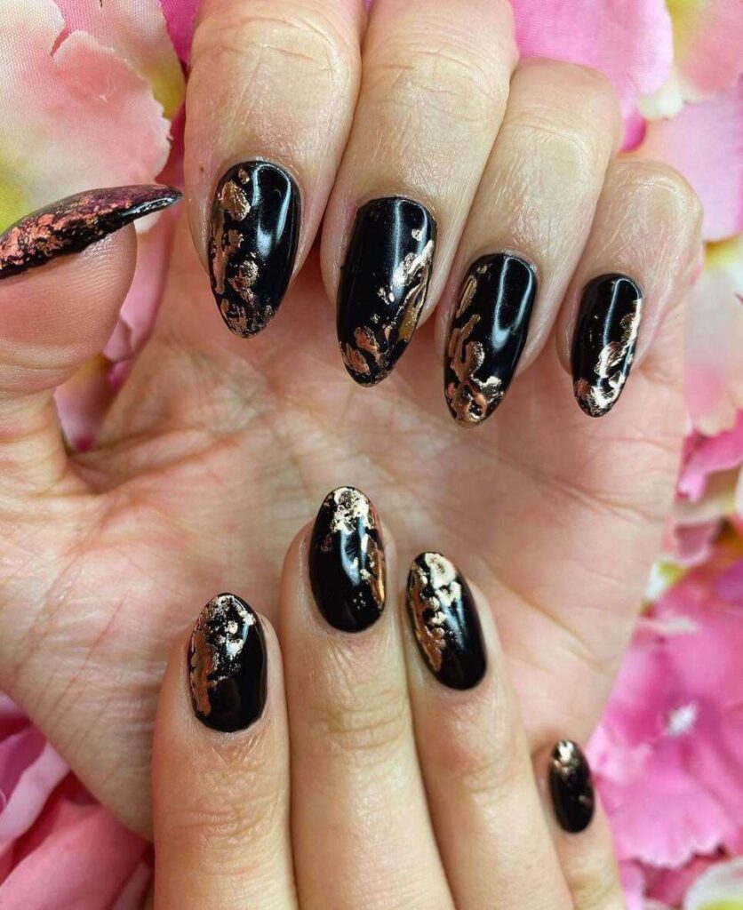 almond black and rose gold nails