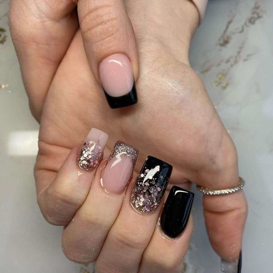 black and rose gold nail design