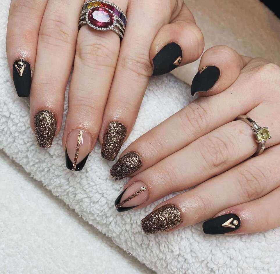 modern black and rose gold nails