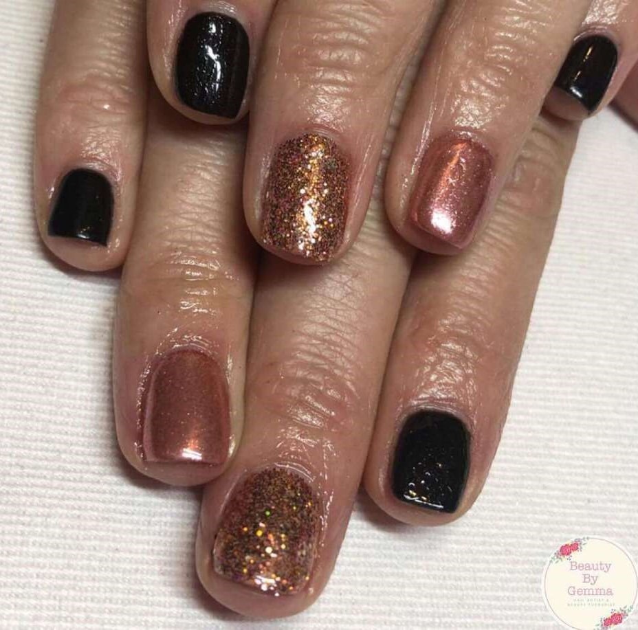 short black and rose gold nails