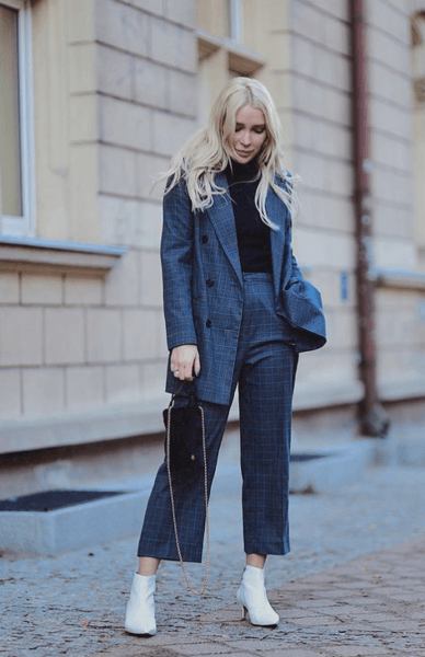 black turtleneck outfit in a gray suit