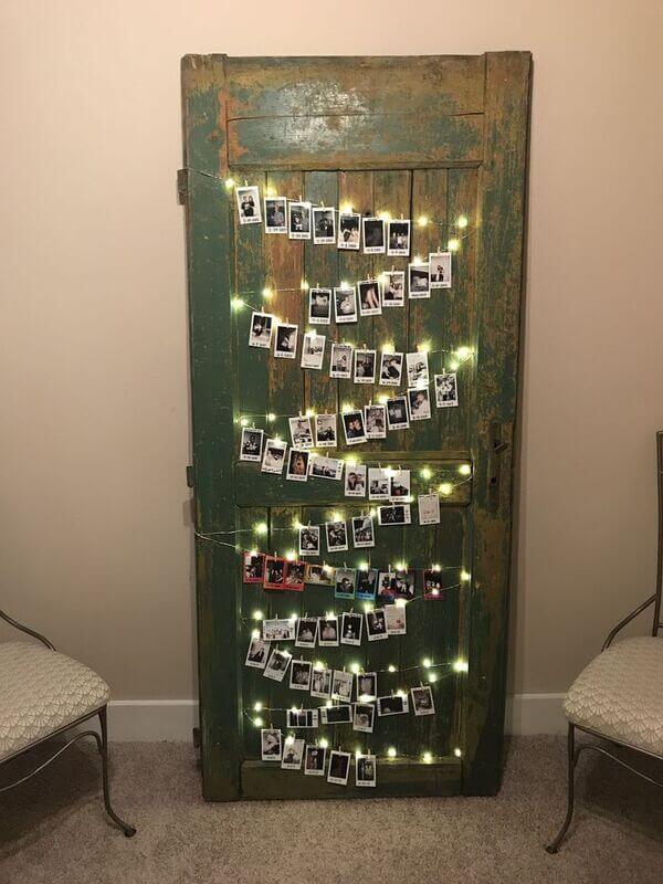 fairy lights nad pictures on a bedroom door decor ideas