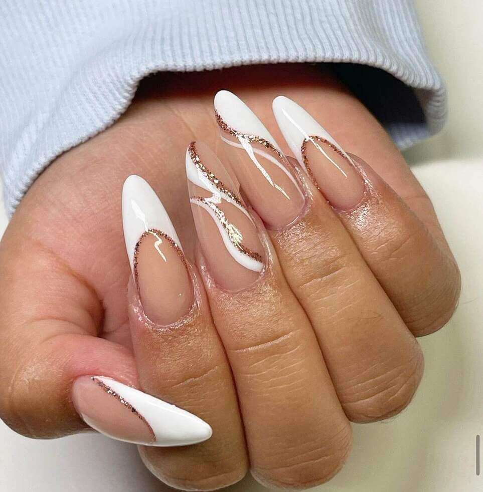 white and gold long graduation nail designs.