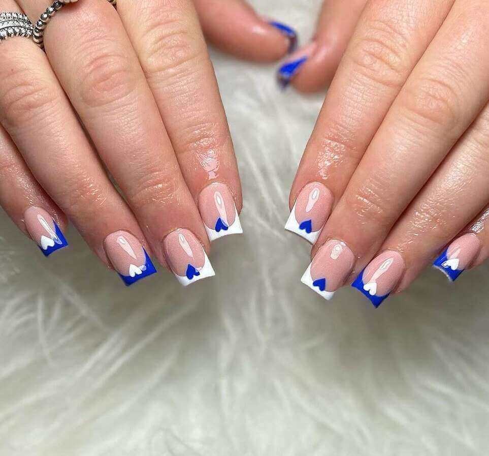 white and blue graduation nail ideas.