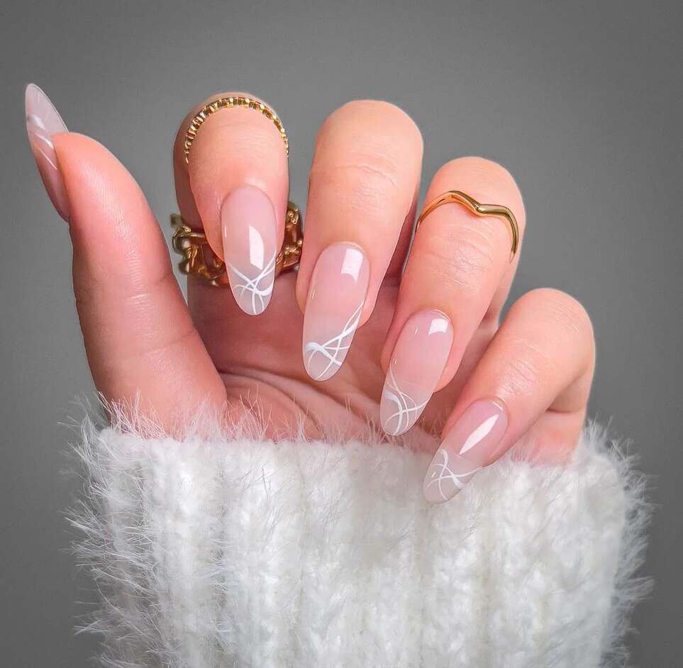 elegant white neutral graduation nails.