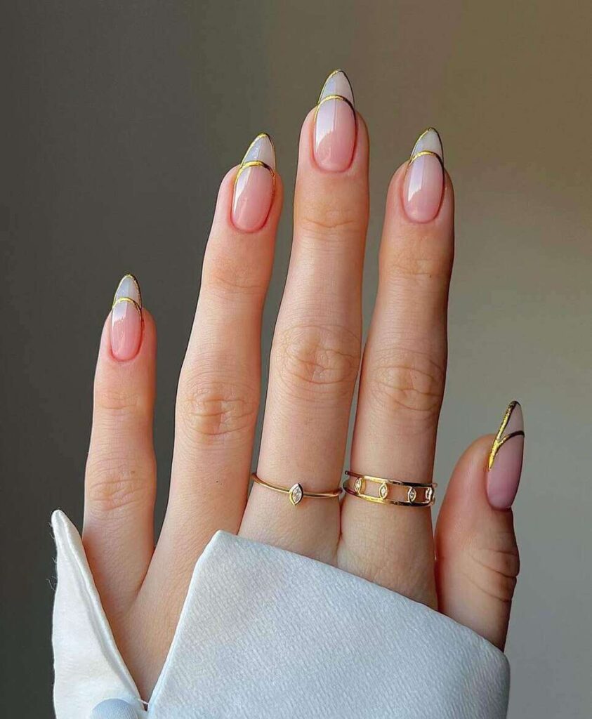 gold neutral long graduation nail designs.