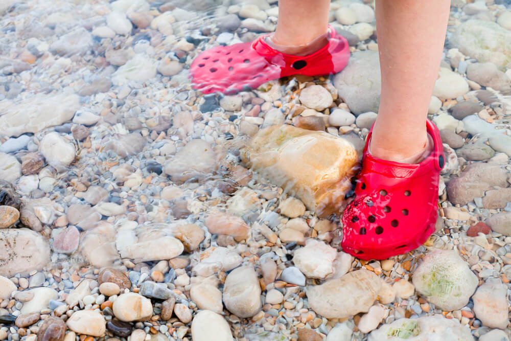 Swimming shoes for pebbly beaches online