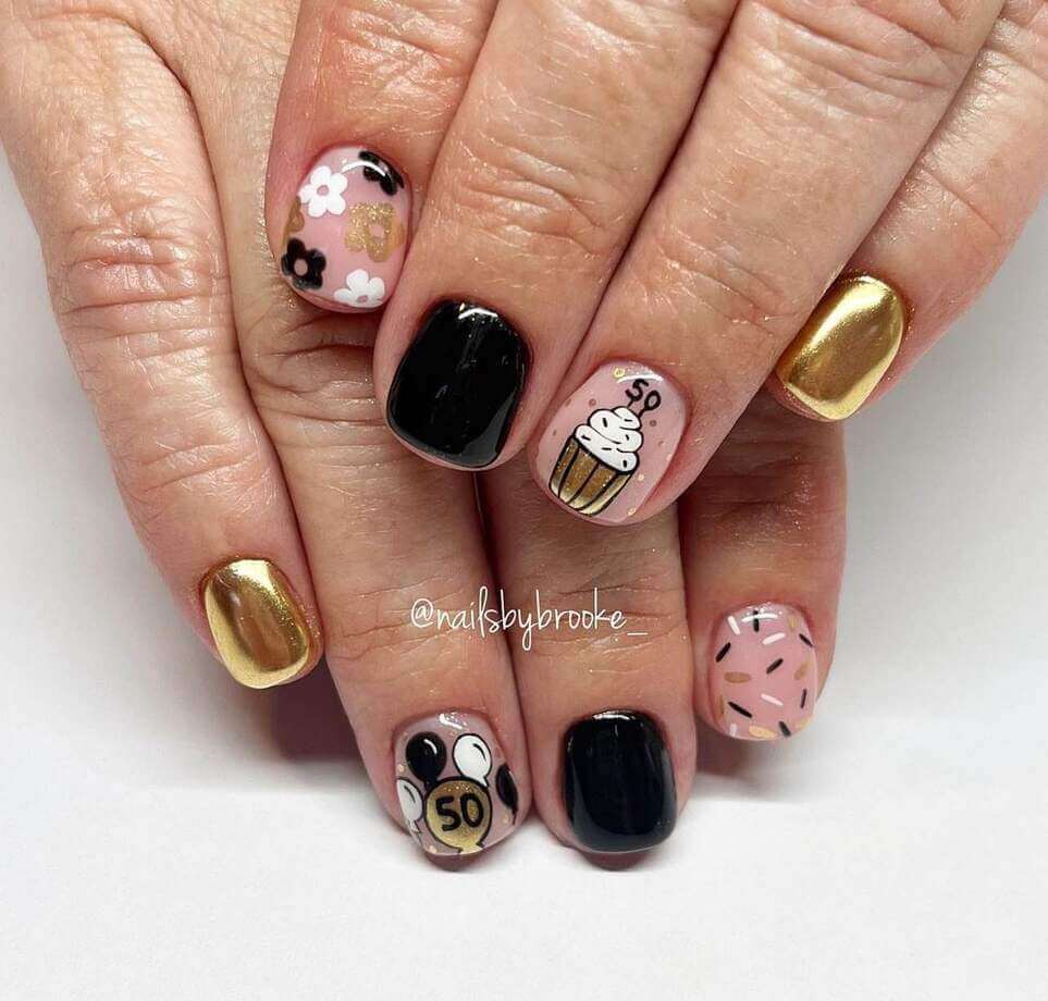 black and gold birthday nails