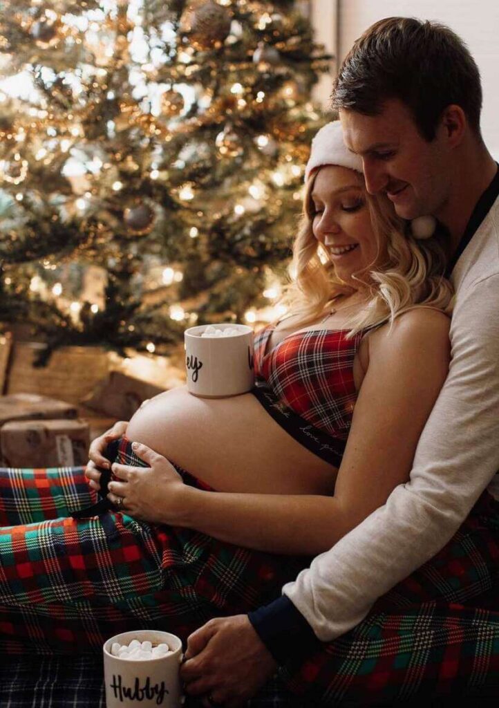 maternity Christmas photoshoot couple