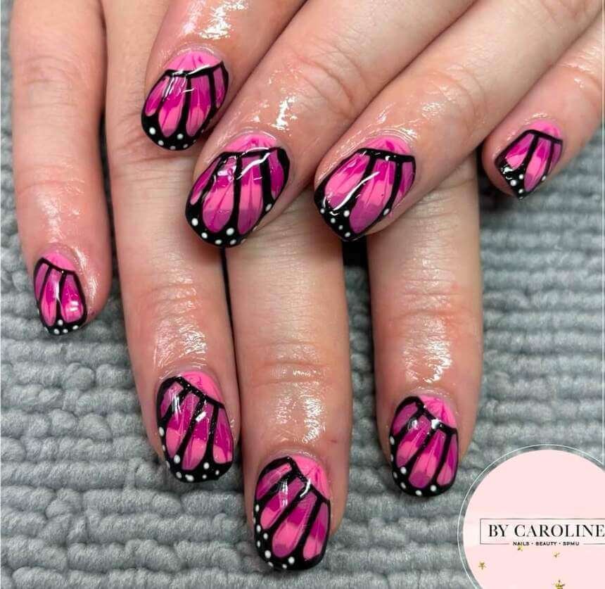 short pink butterfly nails