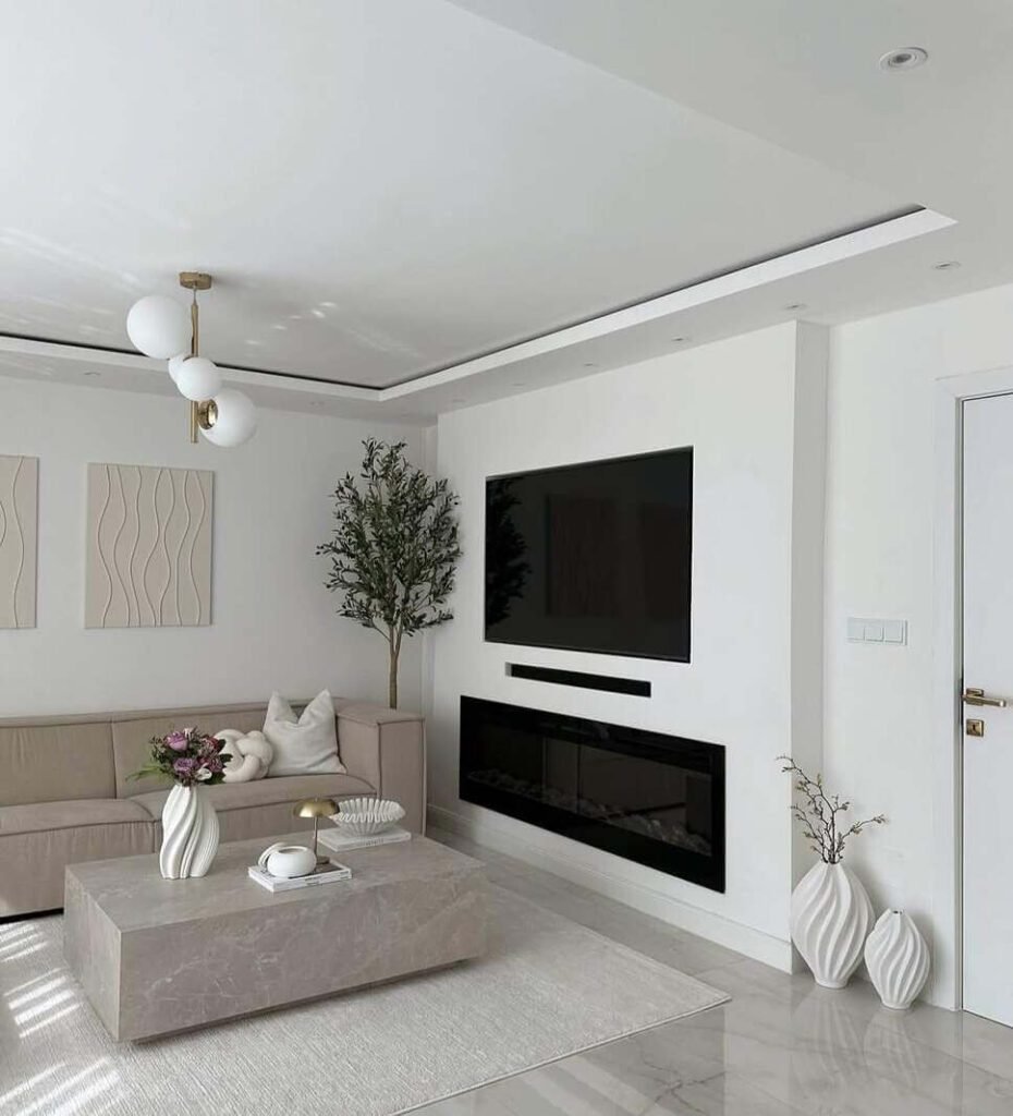 living room above fireplace tv wall