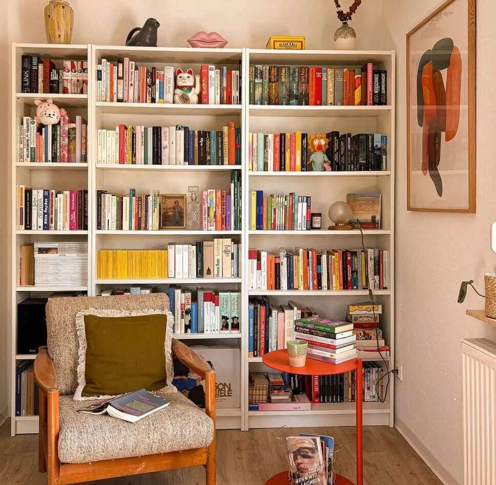 reading nook ideas in front of a bookshelf
