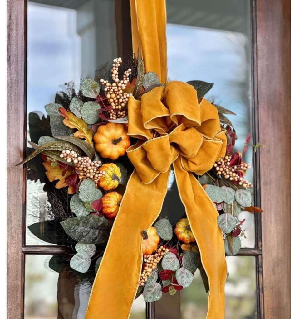 fall wreath with a velvet ribbon