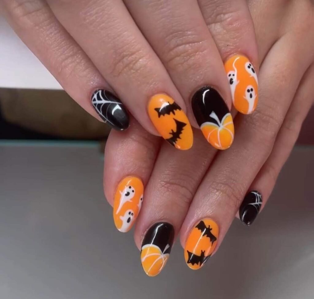 black and orange Halloween nails