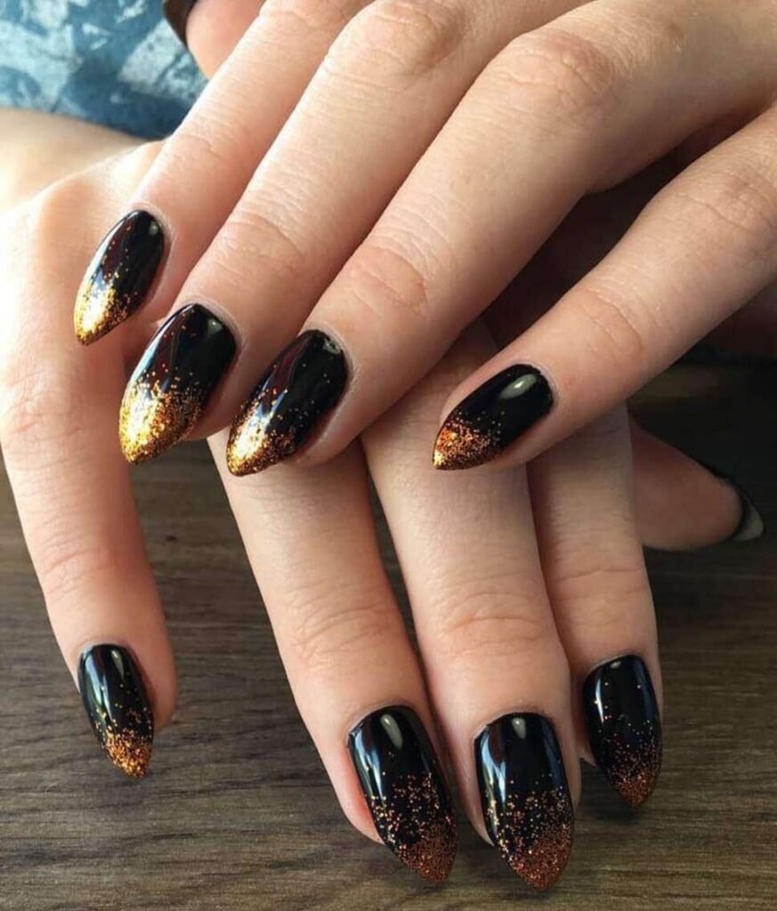 black and orange halloween nails