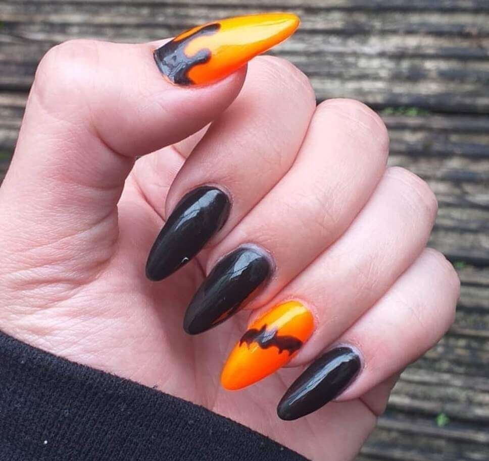 black and orange halloween nails
