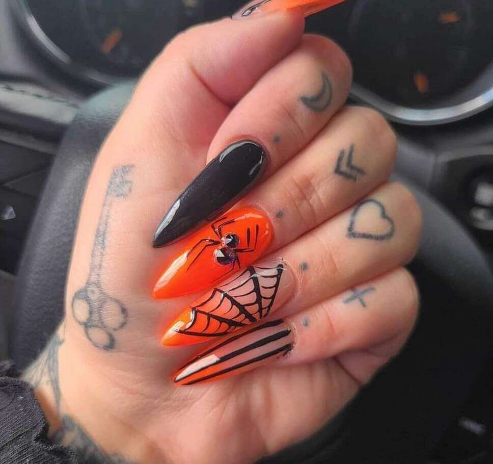black and orange halloween nails