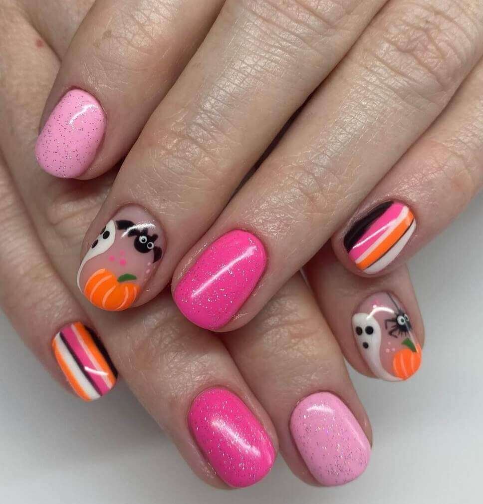 pink and orange Halloween nails