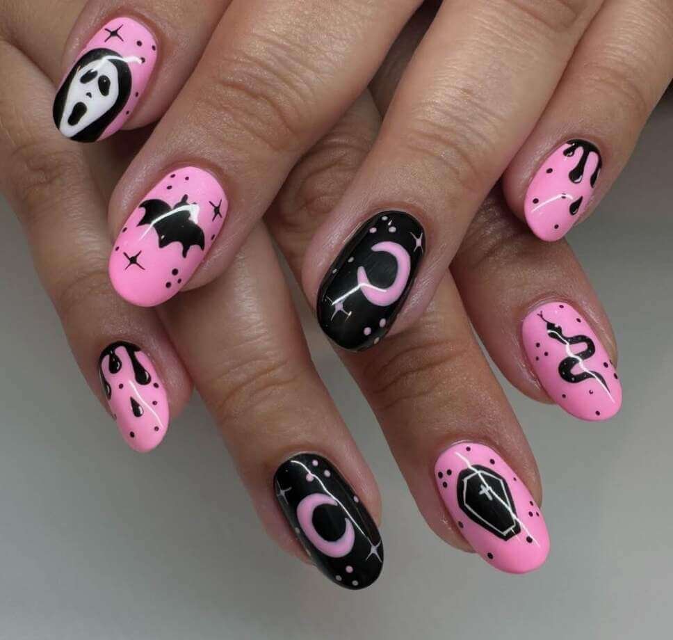 pink and black halloween nails