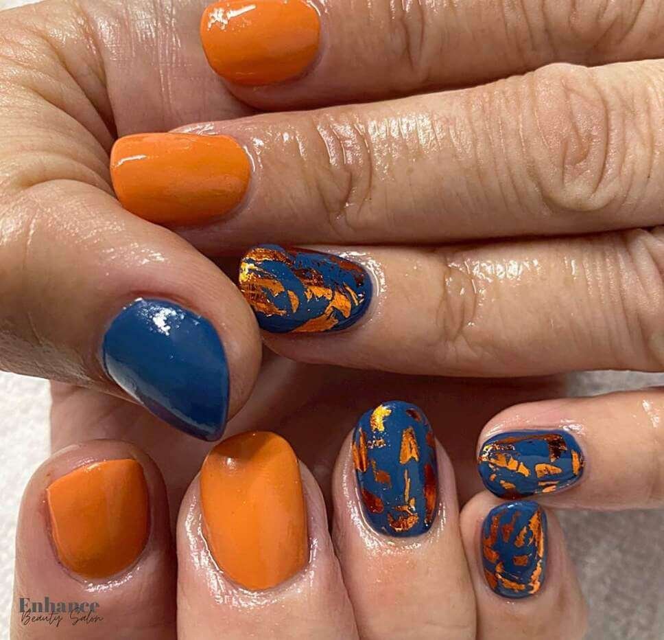 blue and burnt orange nails