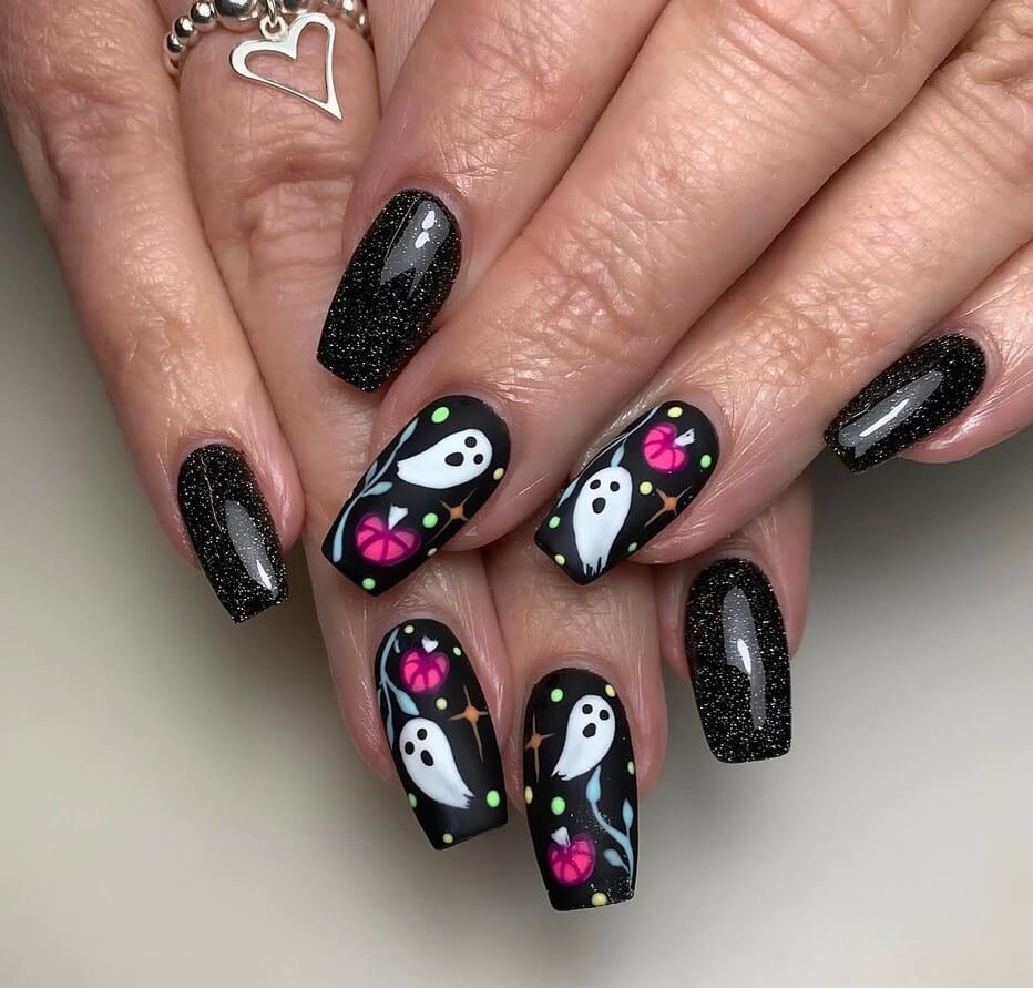 pink and black halloween nails